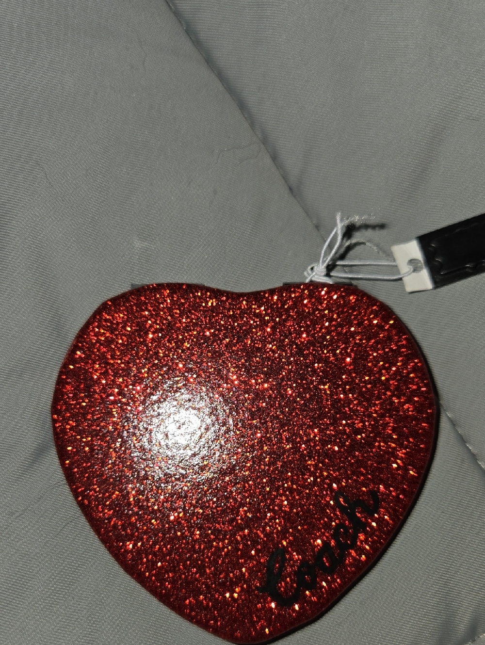 Coach Glitter Heart Compact Mirror (Style CF153) featuring a red glitter Outside